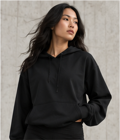 Model wearing the Lightweight Layer Hoodie in black, front view
