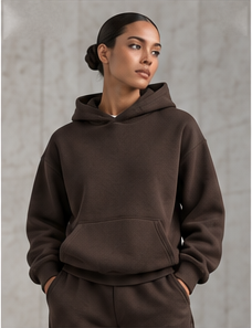 Model wearing the Lightweight Layer Hoodie in walnut brown, front view