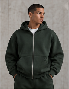 Model wearing the Tech Fleece Zip Hoodie in forest green, front view