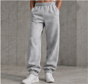 Model wearing the Performance Jogger in heather grey, front view