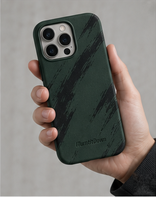 Impact Phone Case in forest held in one hand