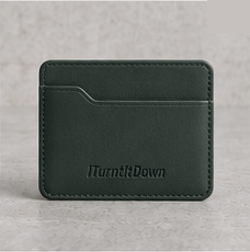 Card Holder in forest leather with the embossed ITurntItDown wordmark, on concrete